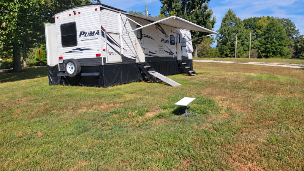 Starlink dish providing internet beside our RV in rural Tennessee